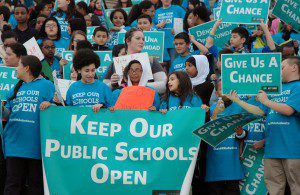 Students practice their chants for legislators
