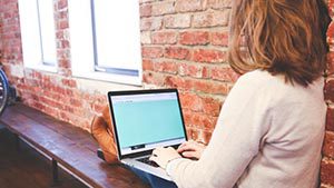 teacher on computer