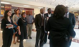 The team tours a school in Baltimore. (Tracy Sherman on the far left.)