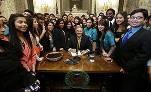 Governor Jay Inslee signs the Dream Act (Real Hope Act). Photo by the Seattle PI. Governor Jay Inslee signs the Dream Act (Real Hope Act). Photo by the Seattle PI.