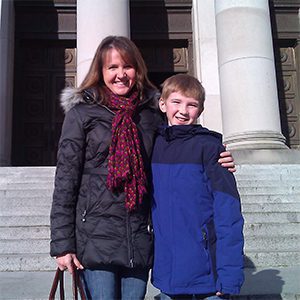 Beth Sigall with her son in Olympia