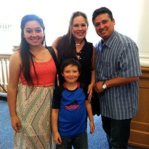 The Guerra family at the June 6 State Board of Education forum. From left: From left to right, Ashley, her younger brother Julito, her mom Yelenys, and her dad Julio.